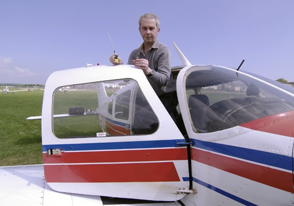 Steve Daniels poses with the Vulture 1 GPS board