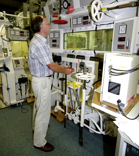 Chas Taylor operating the hypobaric chamber