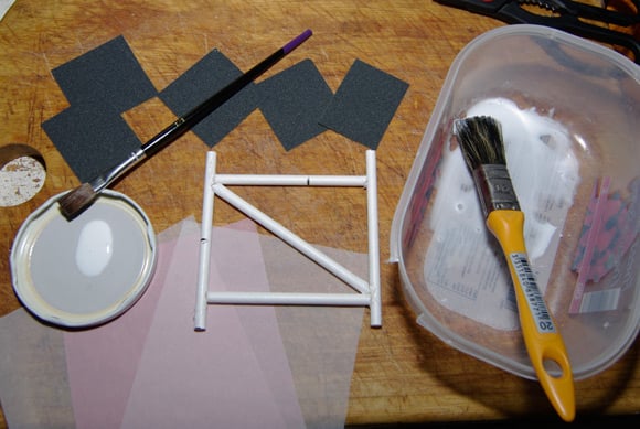 Skinning kit, with tissue paper, glue, and test structure frame