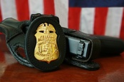 FBI badge and gun