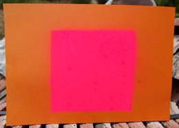 The target - A4 sheet of orange card marked with pink fluorescent paint