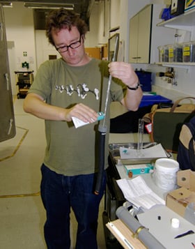 John Oates greases the release mechanism