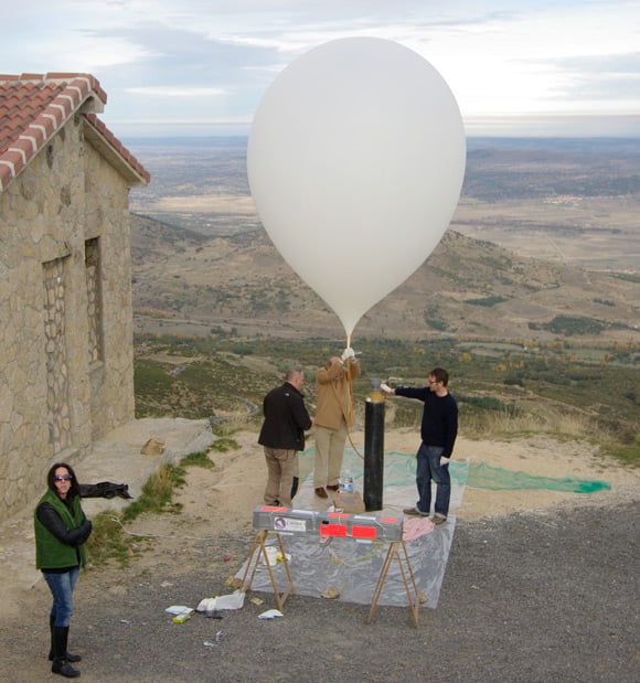 Checking the balloon lift against the water bottle