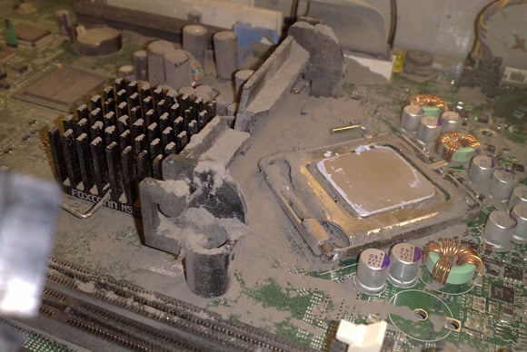 PC motherboard coated in dust