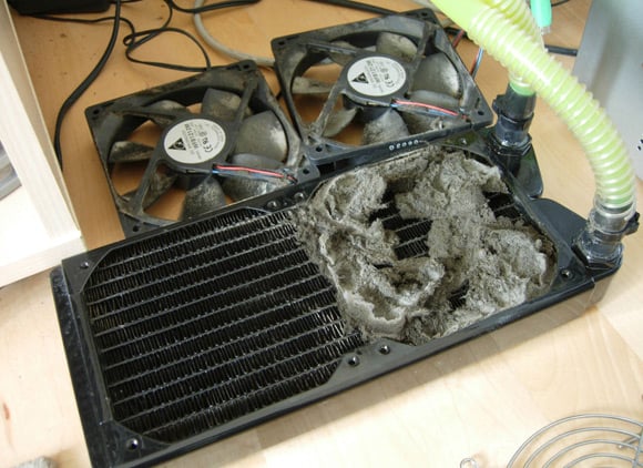 Water cooling unit halfway through a much-needed dust-off