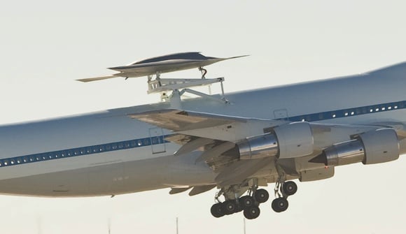 The Phantom Ray UAS piggybacked on NASA's Shuttle transporter 747. Credit: Boeing