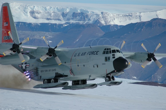 A US C-130 Hercules equipped with skis takes off in the Antarctic using JATO. Credit: DoD