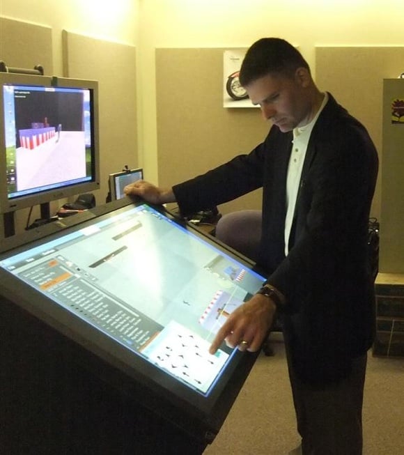Instructor shows off the new US secret service virtual toytown machinery. Credit: DHS