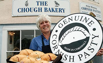 Cornish maiden bearing platter of genuine Cornish pasties. Photo: Cornish Pasty Association