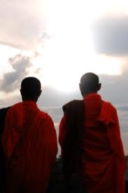 Two Buddhist monks face the sky