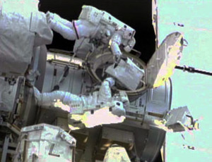 Drew Feustel (top) and Mike Fincke conduct the second spacewalk of the STS-134 mission. Photo: NASA TV