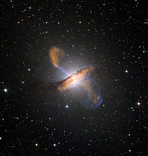 Particle jets belching from the supermassive black hole at the centre of Centaurus A. Credit: ESO/WFI (visible); MPIfR/ESO/APEX/A.Weiss et al. (microwave); NASA/CXC/CfA/R.Kraft et al. (X-ray)