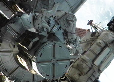  Mike Fossum and Ron Garan exiting the Quest airlock at the beginning of today's EVA. pic: NASA TV