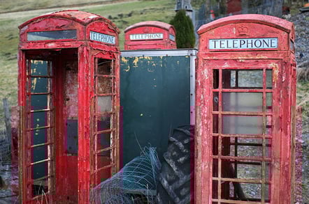 Decaying red telephone boxes