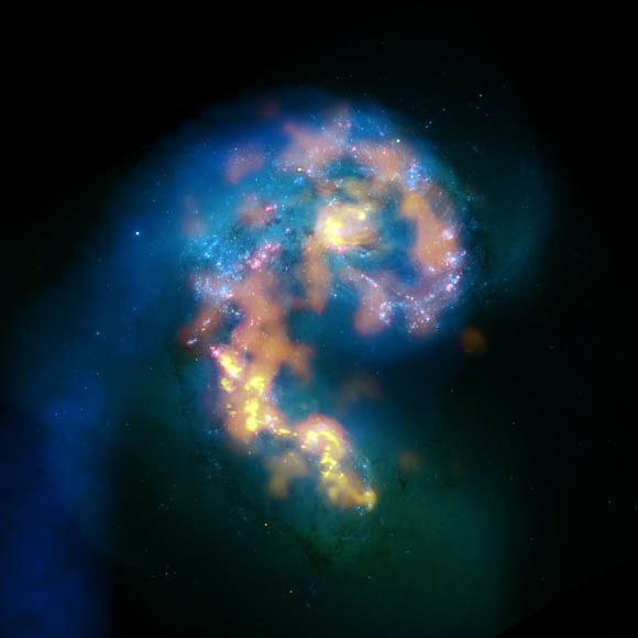 Clouds of gas and dust at the Antennae Galaxies’ impact zone, 45 million light-years away