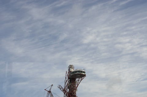 Tower by Anish Kapoor and the Main Stadium under construction, credit The Regist