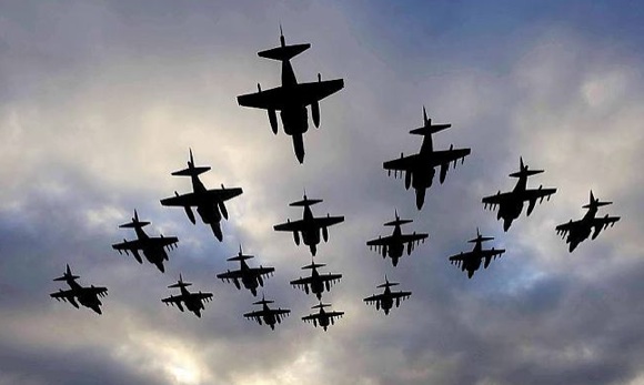 Harrier GR9s in a formation flypast to mark the type's departure from British service. Credit: Crown Copyright/Jamie Hunter