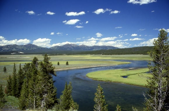 The rim of a supervolcano caldera seen in the distance in the Yellowstone National Park. Credit: US National Park Service