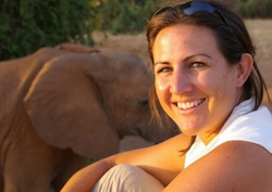 British biologist, Dr Lucy E King and an elephant