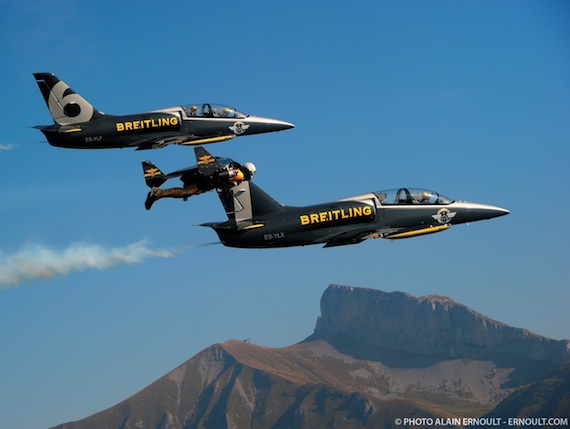 Strap on thruster daredevil shows off Swiss peak formation The Register