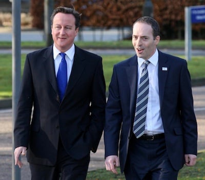 Prime Minister David Cameron arrives alongside BT CEO Ian Livingstone (right) at Adastral Park, BT's global innovation and development centre in Ipswich, Suffolk