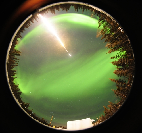 Fisheye camera shot of MICA rocket shot into aurora borealis