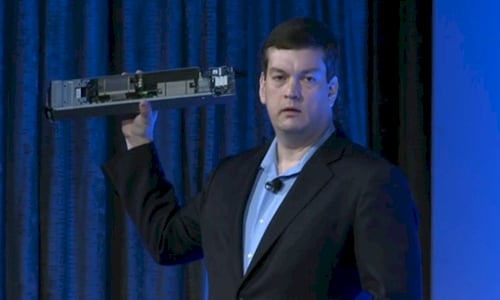 Dell's Forrest Norrod holding a baby blade server