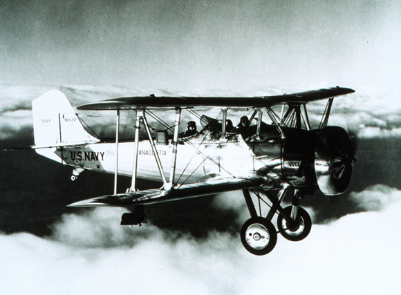 US Navy biplane in flight in December 1934