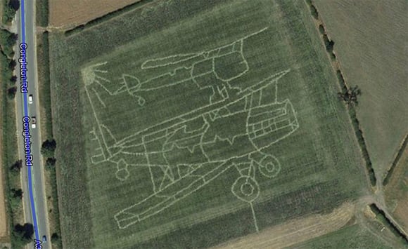 The outlines of two vintage aircraft seen in Staffordshire field
