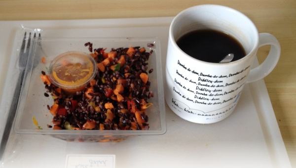 Pic of Verity's lunch: fancy salad stuff and coffee.