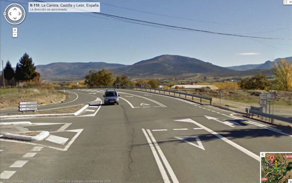 View of the main road close to the river Aravalle, with Register van pursuing Street View vehicle