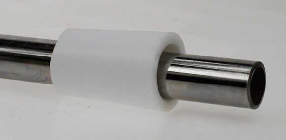 Our Teflon insert on a test length of steel tube