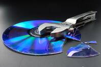 Broken CD with wrench