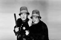 Abbott and Costello dressed as policemen