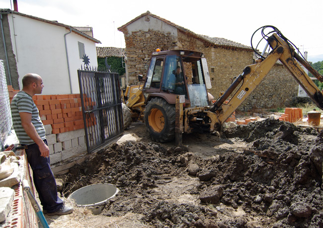 Filling in the hole with soil