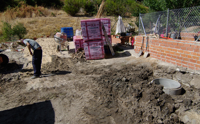 Rui doing the last bit of cleaning around the well