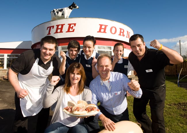 The staff and owners of The Horn celebrate their win. Pic: The Courier
