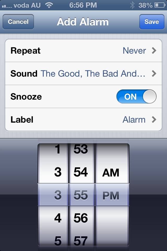 An iPhone 4 running iOS6 and displaying the bug in the Alarms function of the Clock app