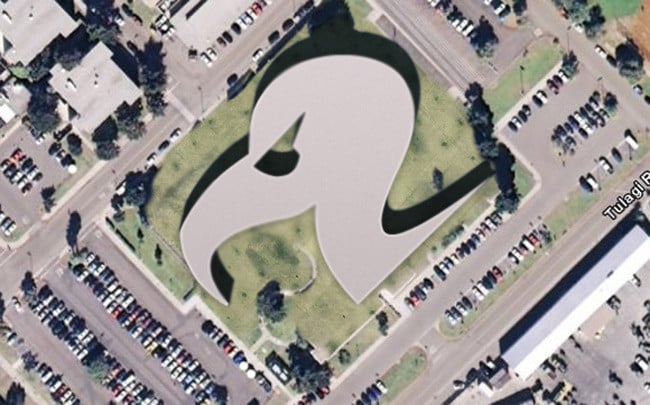An aerial view of a building in the shape of our vulture logo