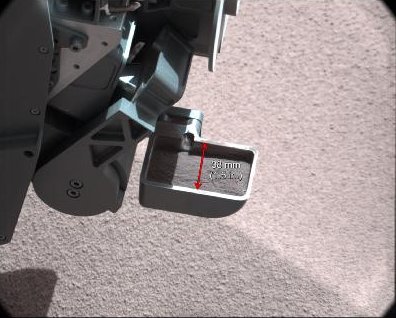 Martian soil in Curiosity&#39;s robotic arm scoop