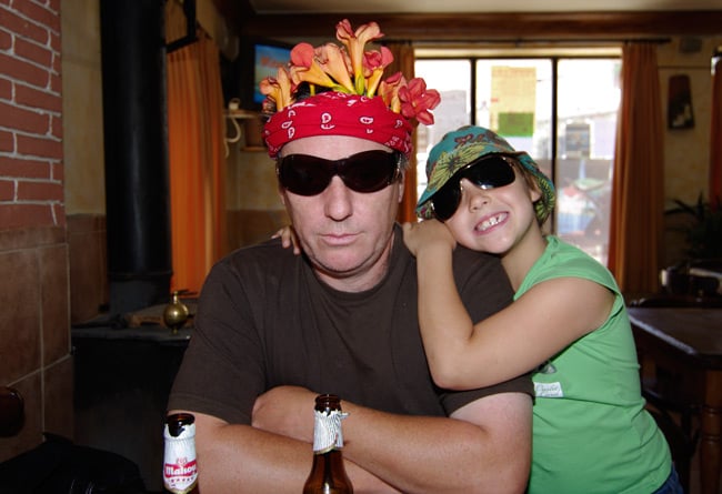 Me in local bar with my daughter, in exotic headdress