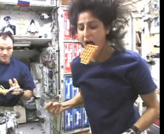 Sunita Williams eating a waffle, credit screengrab NASA video