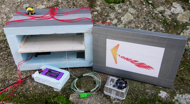 The payload box for the flight, with vid camera and heater battery shown