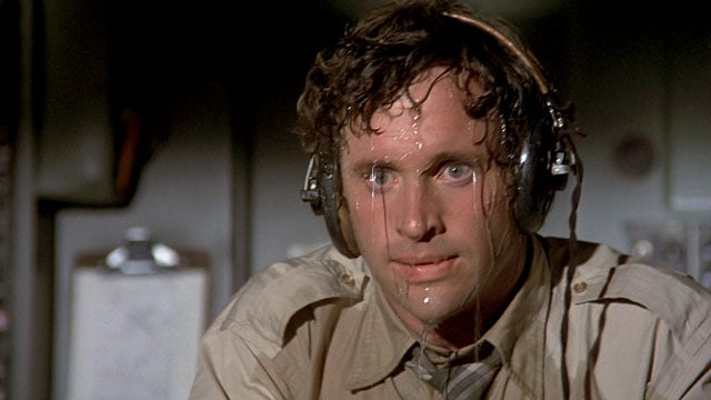 https://regmedia.co.uk/2012/11/30/airplane_paramount_pictures__robert_hays_ted_striker_in_a_sweat.jpg