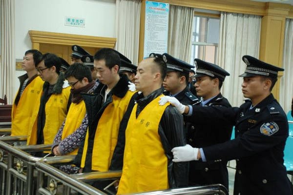 Photo of defendants in Chinese kidney-for-iPhone scheme