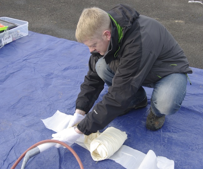 Anthony preps the balloon nozzle for filling