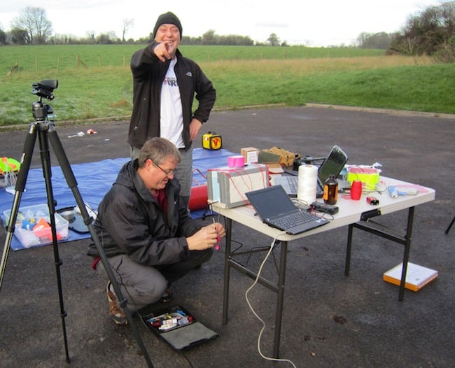 Lester laughing at Dave backing away as he takes a snap of the igniter connection