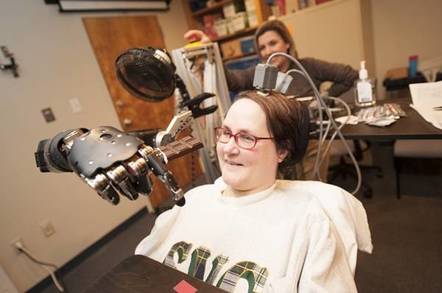 Hector the robot arm feeds BCI patent chocolate