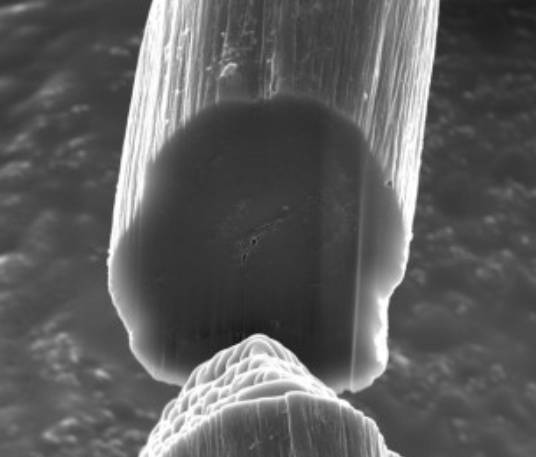 A thread of woven carbon nanotubes