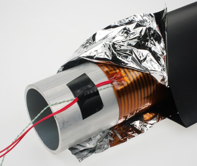 The aluminium tube wrapped with the heater, space blanket and heatshrink, prior to heating